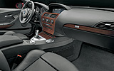 BMW M6 Coup� Aut. Modelo 2008. Imagen. Interior. Guantera con llave. Radio BMW Business CD. Sistema altavoces HiFi.