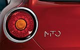 Alfa Romeo MiTo. Modelo 2009. Imagen exterior. Detalle. Piloto trasero izquierdo. Anagrama MiTo. Rojo Giulietta. Llantas de aleaci�n ligera de 18 pulgadas.