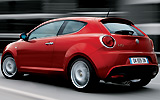 Alfa Romeo MiTo. Modelo 2009. Imagen. Lateral posterior. Movimiento. Carretera. Exterior. Rojo Giulietta.