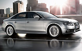 Audi S4. Modelo 2009. Imagen. Exterior. Lateral frontal. Coche en movimiento. Carretera. Gris.