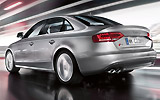 Audi S4. Modelo 2009. Imagen. Exterior. Lateral posterior. Coche en movimiento. Carretera. Gris.