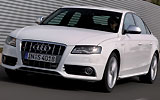 Audi S4. Modelo 2009. Imagen. Exterior. Frontal lateral. Coche en movimiento. Carretera. Blanco.