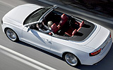 Audi A5 Cabrio. Modelo 2009. Imagen exterior. Cenital. Movimiento. Carretera. Blanco.