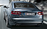 Audi S6. Modelo 2009. Imagen. Berlina. Posterior lateral. Movimiento. Carretera. Azul boreal efecto perla.