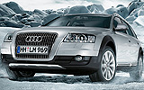 Audi A6 Allroad. Modelo 2009. Frontal lateral. Movimiento. Gris cuarzo metalizado.