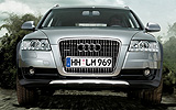 Audi A6 Allroad. Modelo 2009. Frontal. Frontal. Movimiento. Campo. Gris cuarzo metalizado.