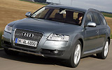Audi A6 Allroad. Modelo 2009. Imagen. Frontal lateral. Movimiento. Carretera. Gris.