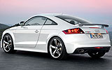 Audi TT RS. Modelo 2009. Carrocer�a Coup�. Imagen. Exterior. Lateral posterior. Coche parado. Carretera. Blanco.