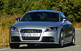 Audi  TTS 2.0 TFSI quattro. Modelo 2009. Coup�. Imagen. Exterior. Frontal lateral. Coche en movimiento. Carretera. Plata.