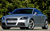 Audi  TTS 2.0 TFSI quattro. Modelo 2009. Coup�. Imagen. Exterior. Frontal lateral. Coche parado. Carretera. Llantas aleaci�n ligera de 18 pulgadas en dise�o de 5 brazos. Plata.