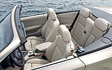 BMW Serie 1 Cabrio. Modelo 2008. Imagen. Interior. Asientos delanteros y traseros cuero Boston Lemon. Reposabrazos delantero.