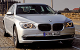 BMW Serie 7. Modelo 2009. Carrocer�a corta. Imagen. Lateral- frontal. Movimiento. Carretera. Gris.