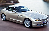 BMW Z4. Modelo 2009. Imagen exterior. Lateral frontal. Movimiento. Carretera. Techo duro plegable sobre la carrocer�a. Carretera.