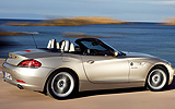 BMW Z4. Modelo 2009. Imagen exterior. Lateral. Movimiento. Descapotado. Carretera.