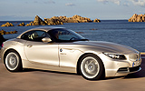 BMW Z4. Modelo 2009. Imagen exterior. Lateral frontal. Movimiento. Carretera.
