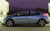 Chevrolet Volt. Modelo 2011. Imagen. Exterior. Lateral. Coche parado. Carretera. Luces de posici�n en on. Gris.