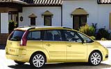 Citro�n C4 Grand Picasso. Modelo 2008. Imagen. Exterior. Lateral posterior. Carretera. Oro Anodise Metalizado.