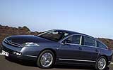 Citro�n C6. Modelo 2008. Imagen. Frontal- lateral. Coche movimiento en carretera. Gris Fer nacarado.