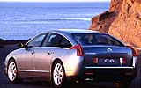 Citro�n C6. Modelo 2008. Imagen. Lateral- posterior. Coche parado. Carretera. Llantas aleaci�n 18 pulgadas. Gris Fer nacarado.