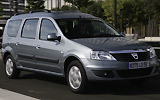 Dacia Logan Break. Modelo 2009. Imagen. Exterior. Lateral frontal. Coche en movimiento. Carretera. Gris.