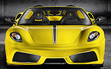 Ferrari 430 Scuderia Spider 16M. Modelo 2009. Imagen exterior. Descapotado. Frontal. Coche parado. Estudio. Amarillo.
