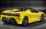 Ferrari 430 Scuderia Spider 16M. Modelo 2009. Imagen exterior. Descapotado. Posterior lateral. Coche parado. Estudio. Amarillo.
