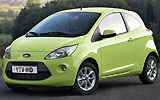 Ford Ka. Modelo 2009. Imagen exterior. Frontal lateral. Coche parado. Carretera. Verde.