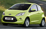 Ford Ka. Modelo 2009. Imagen exterior. Frontal lateral. Coche en movimiento. Carretera. Verde.