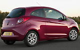 Ford Ka. Modelo 2009. Imagen exterior. Posterior lateral. Coche parado. Carretera.