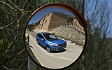Ford Kuga. Modelo 2009. Imagen. Exterior. Detalle del reflejo del coche en el espejo.