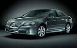 Honda Legend. Modelo 2009. Imagen. Frontal- lateral . Coche parado. Estudio. Gris oscuro.