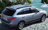 Hyundai ix55. Modelo 2009. Imagen. Exterior. Lateral posterior cenital. Coche parado. Carretera.