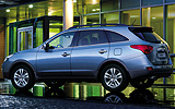 Hyundai ix55. Modelo 2009. Imagen. Exterior. Lateral. Coche parado. Carretera.
