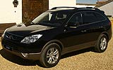 Hyundai ix55. Modelo 2009. Imagen. Exterior. Frontal lateral. Coche parado. Carretera. Color Ebony Black.