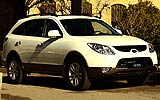 Hyundai ix55. Modelo 2009. Imagen. Exterior. Lateral frontal. Parado. Coche en carretera. Color Vanilla White.