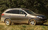 Hyundai ix55. Modelo 2009. Imagen. Exterior. Lateral. Coche en movimiento. Carretera.