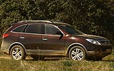 Hyundai ix55. Modelo 2009. Imagen. Exterior. Lateral. Coche en movimiento. Carretera. Superior Red.