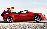 Infiniti G37 Cabrio. Modelo 2009. Imagen. Exterior. Lateral. Coche parado. Carretera. Descapotado. Azul.