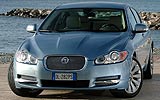 Jaguar XF. Modelo 2009. Imagen. Exterior. Frontal. Coche parado. Carretera. Color Azure Blue.