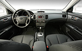 KIA Magentis. Modelo 2009. Imagen interior. Salpicadero. Cuadro de mandos. Consola central. Palanca de cambios.