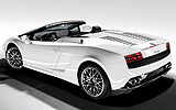 Lamborghini Gallardo LP 560-4 Spyder. Modelo 2009. Imagen exterior. Lateral posterior. Descapotado. Coche parado. Estudio. Blanco
