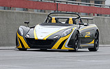 Lotus 2-Eleven. Gama 2008. Imagen. Frontal lateral. Coche parado. Carretera. Biplaza.