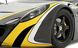 Lotus 2-Eleven. Gama 2008. Imagen. Detalle. Frontal. Faro. Llanta. Coche parado. Estudio. Biplaza.