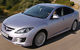 Mazda6. Modelo 2008. Kit deportivo (SAP). Imagen. Frontal- lateral- cenital. Movimiento. Carretera. Color Gris.