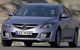 Mazda6. Modelo 2008. Kit deportivo (SAP). Imagen. Frontal- lateral. Movimiento. Carretera. Color Gris.