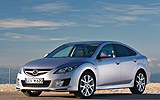 Mazda6. Modelo 2008. Kit deportivo (SAP). Imagen. Frontal lateral. Coche parado. Carretera. Color Gris.