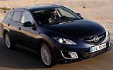 Mazda6 Wagon. Modelo 2008. Kit deportivo (SAP). Imagen. Exterior. Lateral frontal. Coche en movimiento. Carretera.