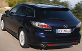 Mazda6 Wagon. Modelo 2008. Kit deportivo (SAP). Imagen. Exterior. Lateral posterior. Coche en movimiento. Carretera.