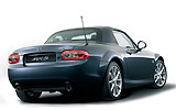Mazda MX-5. Roadster Coup&eacute;. Modelo 2009. Imagen exterior. Posterior- lateral. Coche parado. Techo met&aacute;lico plegable. Estudio. Gris oscuro.