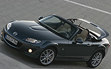 Mazda MX-5. Roadster Coup&eacute;. Modelo 2009. Imagen exterior. Carretera. Gris.